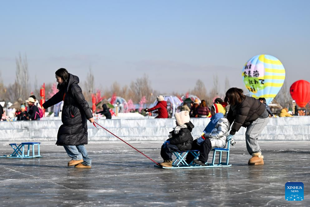 Winter fishing event held in Hasuhai scenic area in Hohhot, N China