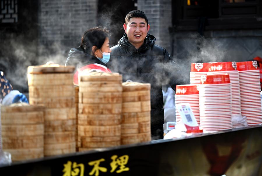 Tianjin's Yangliuqing enchants tourists with Spring Festival atmosphere